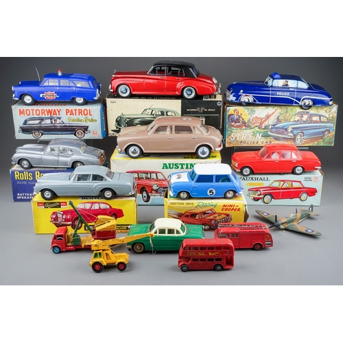 575 - A box of boxed and loose die cast, plastic and tin plate vehicles, the boxed cars comprise a Bandai ... 