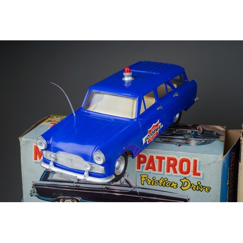 575 - A box of boxed and loose die cast, plastic and tin plate vehicles, the boxed cars comprise a Bandai ... 