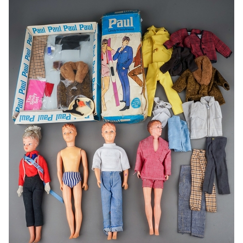 577 - Vintage Paul and Sindy interest, a box containing three Paul dolls, a Sindy doll wearing sash and cr... 