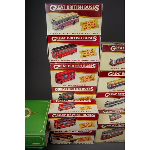 584 - A collection of twenty one modern boxed diecast buses, including a collection of fifteen Atlas Editi... 