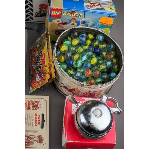 585 - A box of mostly boxed late 20th century tin plate and other childrens and collectors toys, including... 