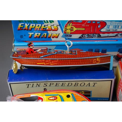 585 - A box of mostly boxed late 20th century tin plate and other childrens and collectors toys, including... 