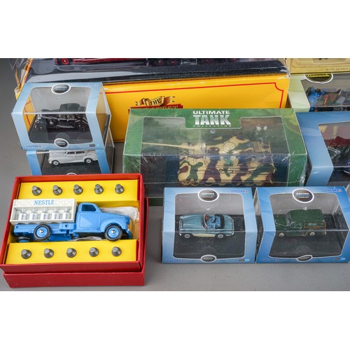 586 - Twenty seven boxed modern die cast vehicles and sets by Corgi, Oxford, Matchbox, Lledo, etc, include... 