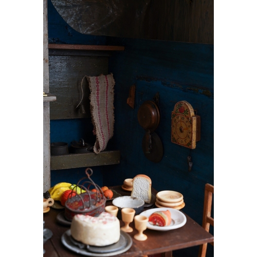 603 - A rare 19th Folk Art dolls diorama of a kitchen, complete with full interior and accessories, includ... 