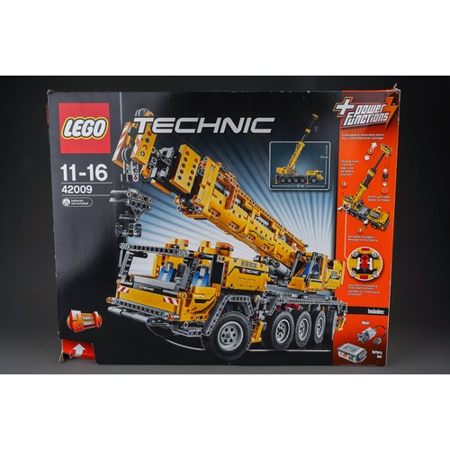 613 - Assorted Lego models, all dismantled with boxes and instructions, unchecked, to include: 
1. LegoTec... 