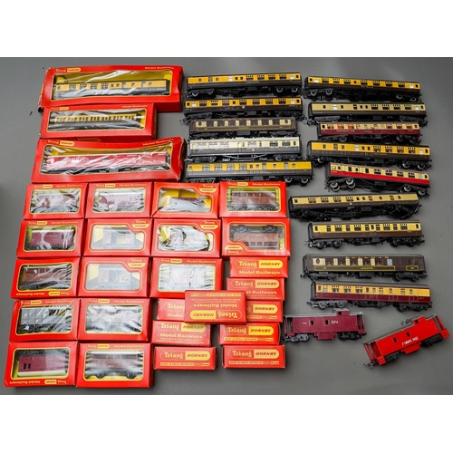 619 - Assorted mainly Tri-ang Hornby model railway 00 gauge carriages, rolling stock and wagons, boxed and... 