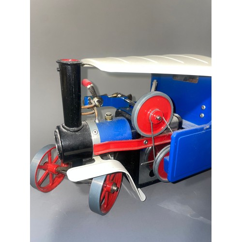 632 - A vintage Mamod Steam Wagon SW1 in blue and red livery, with wooden barrels