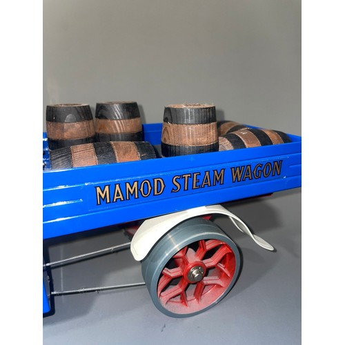 632 - A vintage Mamod Steam Wagon SW1 in blue and red livery, with wooden barrels