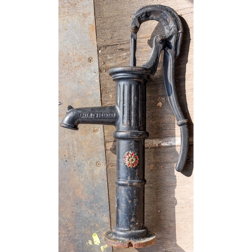 639 - A vintage cast metal water pump