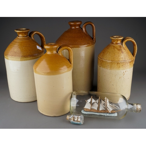 644 - Four assorted stoneware flagons and two ships in bottles, all flagons with handles, one stamped Pear... 