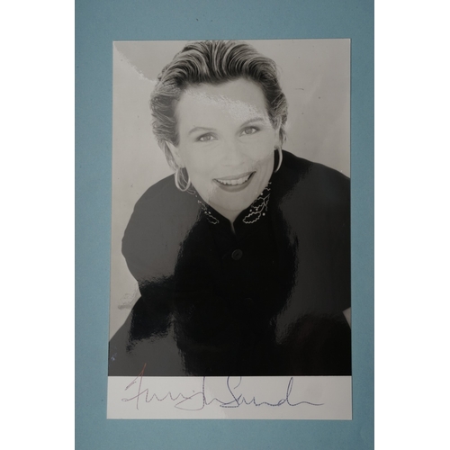 653 - Autographs, a folder containing approximately one hundred signed publicity cards, photographs and le... 