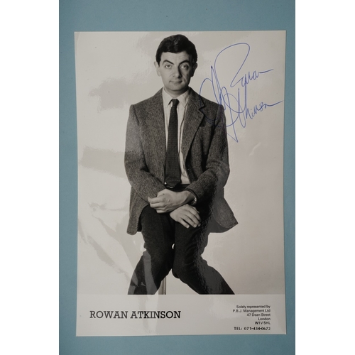 653 - Autographs, a folder containing approximately one hundred signed publicity cards, photographs and le... 