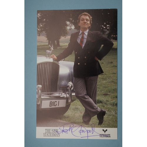 653 - Autographs, a folder containing approximately one hundred signed publicity cards, photographs and le... 