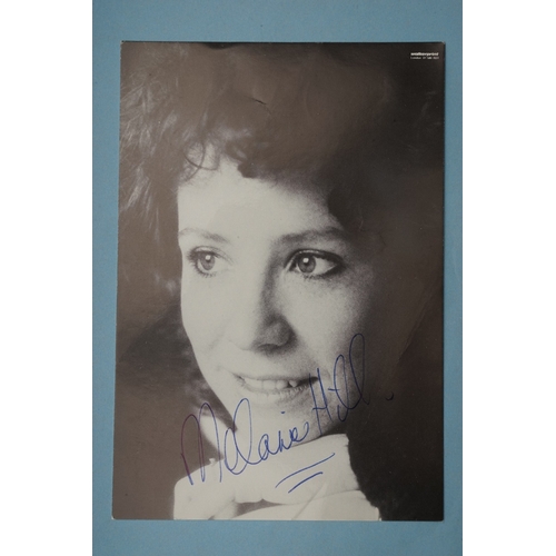 653 - Autographs, a folder containing approximately one hundred signed publicity cards, photographs and le... 