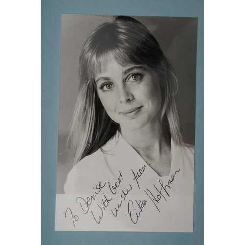 653 - Autographs, a folder containing approximately one hundred signed publicity cards, photographs and le... 