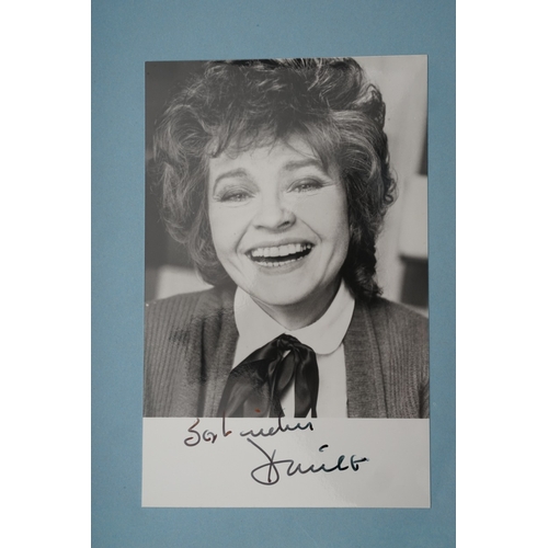 653 - Autographs, a folder containing approximately one hundred signed publicity cards, photographs and le... 