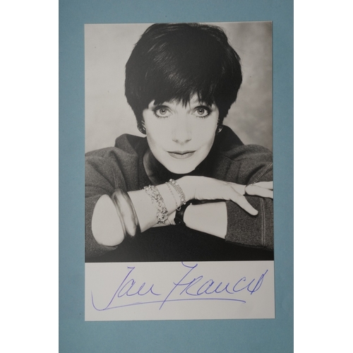 653 - Autographs, a folder containing approximately one hundred signed publicity cards, photographs and le... 