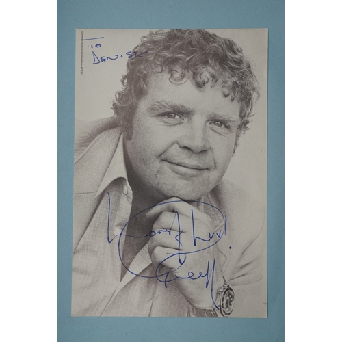 653 - Autographs, a folder containing approximately one hundred signed publicity cards, photographs and le... 