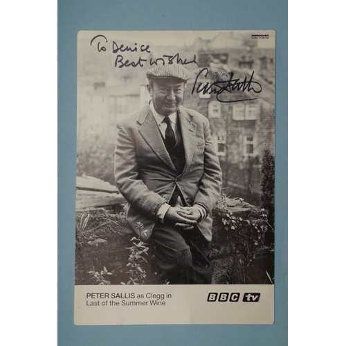 653 - Autographs, a folder containing approximately one hundred signed publicity cards, photographs and le... 