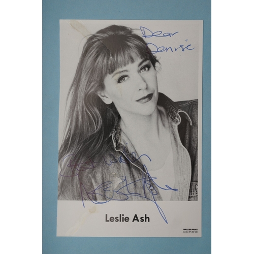 653 - Autographs, a folder containing approximately one hundred signed publicity cards, photographs and le... 