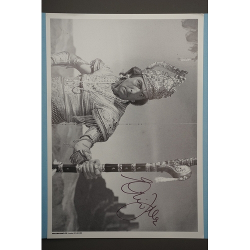 653 - Autographs, a folder containing approximately one hundred signed publicity cards, photographs and le... 