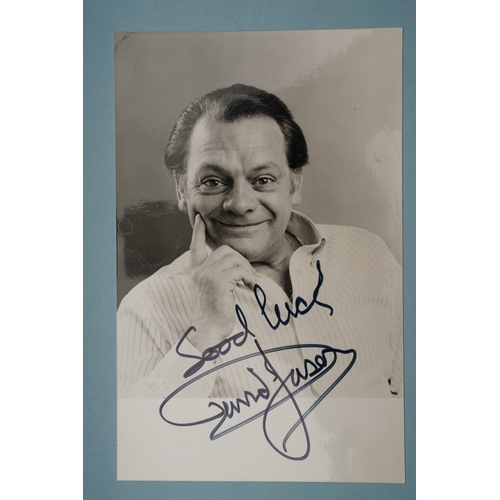 653 - Autographs, a folder containing approximately one hundred signed publicity cards, photographs and le... 