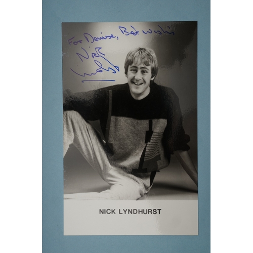 653 - Autographs, a folder containing approximately one hundred signed publicity cards, photographs and le... 