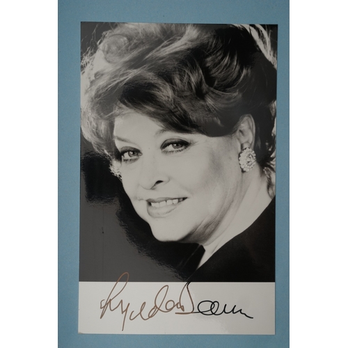 653 - Autographs, a folder containing approximately one hundred signed publicity cards, photographs and le... 