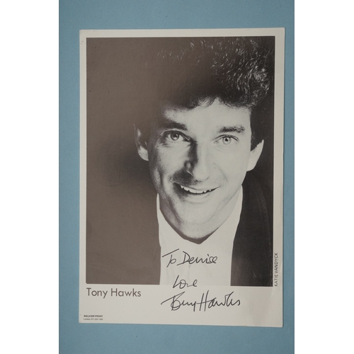 653 - Autographs, a folder containing approximately one hundred signed publicity cards, photographs and le... 