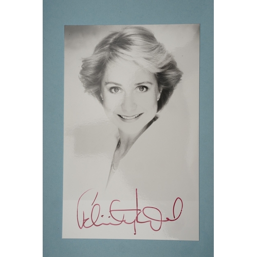 653 - Autographs, a folder containing approximately one hundred signed publicity cards, photographs and le... 