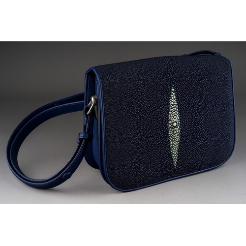 654 - A Sea Star Stingray skin navy blue handbag with cream lozenge detail to the flap, adjustable strap, ... 