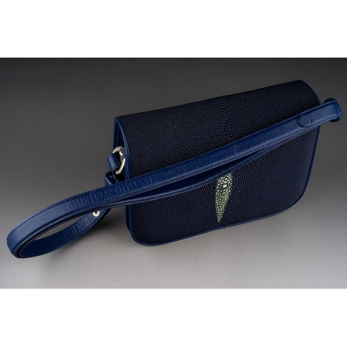 654 - A Sea Star Stingray skin navy blue handbag with cream lozenge detail to the flap, adjustable strap, ... 