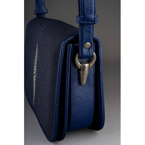 654 - A Sea Star Stingray skin navy blue handbag with cream lozenge detail to the flap, adjustable strap, ... 