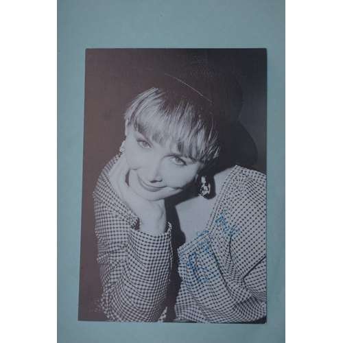 655 - Autographs, a folder containing over eighty signed publicity photos, letters, magazines or scraps of... 