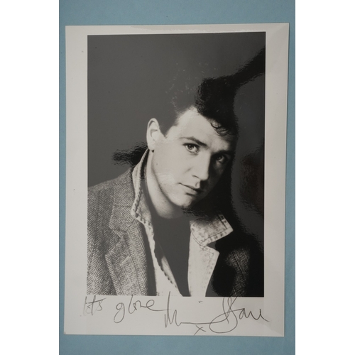 655 - Autographs, a folder containing over eighty signed publicity photos, letters, magazines or scraps of... 