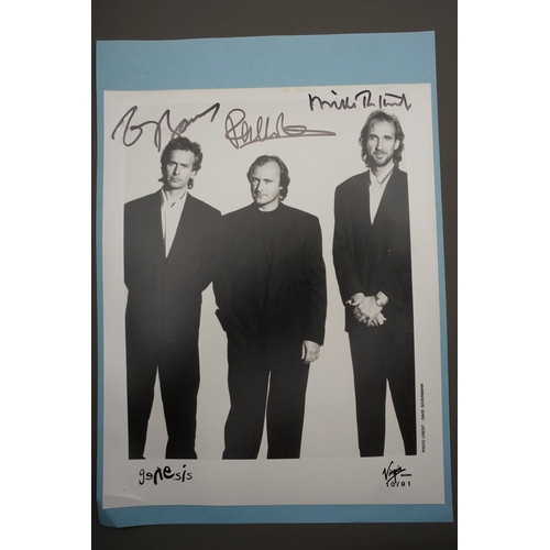 655 - Autographs, a folder containing over eighty signed publicity photos, letters, magazines or scraps of... 