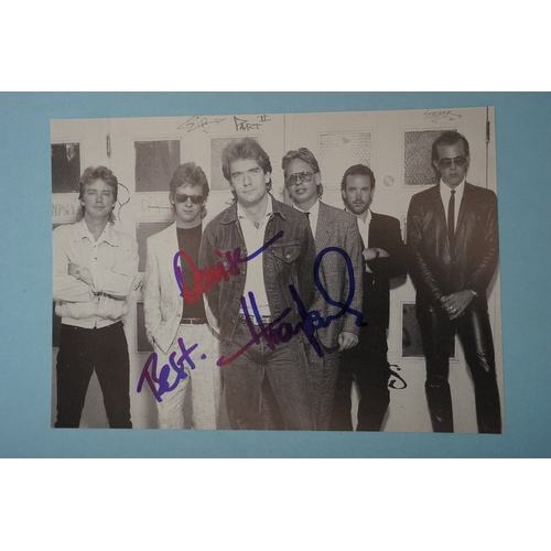 655 - Autographs, a folder containing over eighty signed publicity photos, letters, magazines or scraps of... 