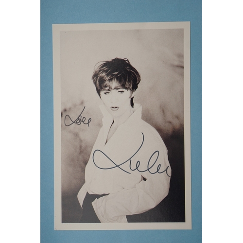 655 - Autographs, a folder containing over eighty signed publicity photos, letters, magazines or scraps of... 