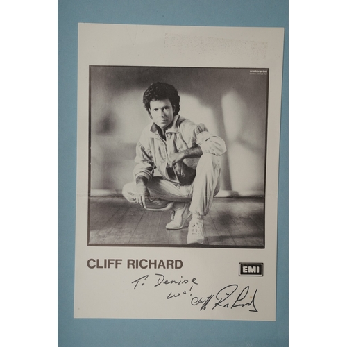 655 - Autographs, a folder containing over eighty signed publicity photos, letters, magazines or scraps of... 