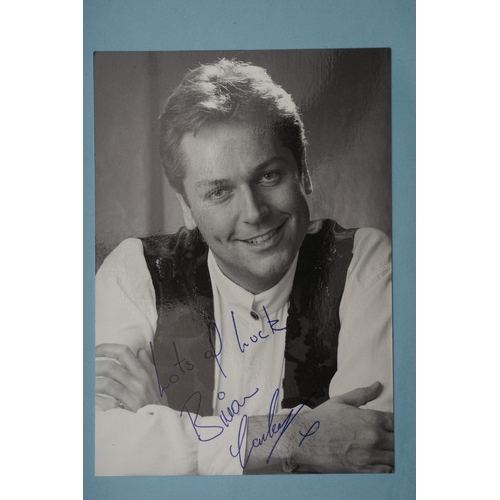 656 - Autographs, a folder containing approximately seventy five signed publicity photographs and letters,... 