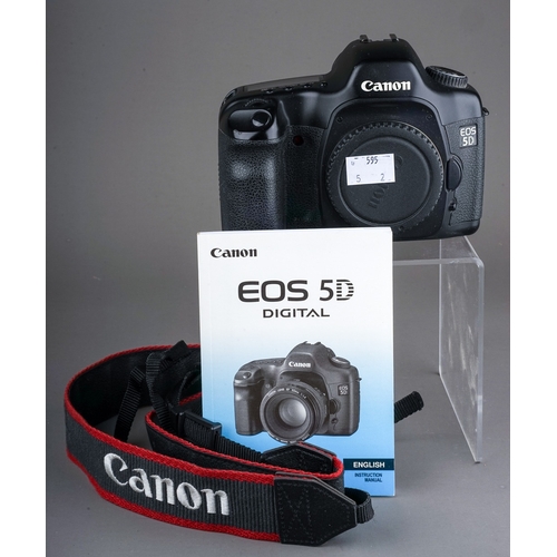 662 - A Canon EOS 5D camera along with a Sigma 24-70mm f/2.8 DG lens with original box