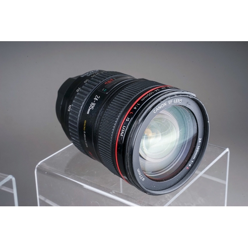 665 - A Canon EF 24-105MM MACRO L IS USM f/4 lens along with a Canon EF 16-35MM f/4 L IS USM lens and Sigm... 