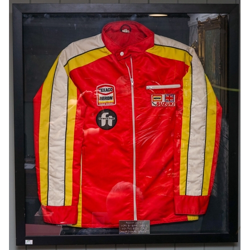 672 - Motorcycling interest- Framed Paddock jacket as worn by Barry Sheene - 2 times world 500CC motorcycl... 