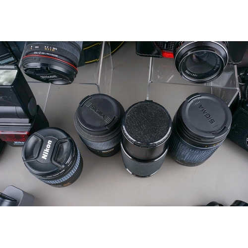 674 - A collection of mixed cameras and accessories to include Praktica mtl3 With tesser 50mm 2.8, Optimal... 