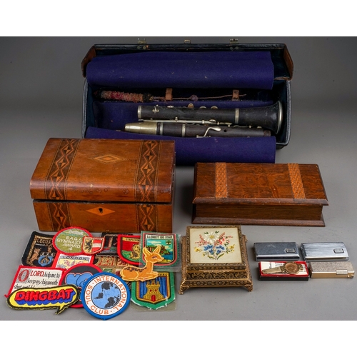 677 - A cased Hawkes & Son Excelsior Class clarinet, a small quantity of cloth badges including 'The Refer... 