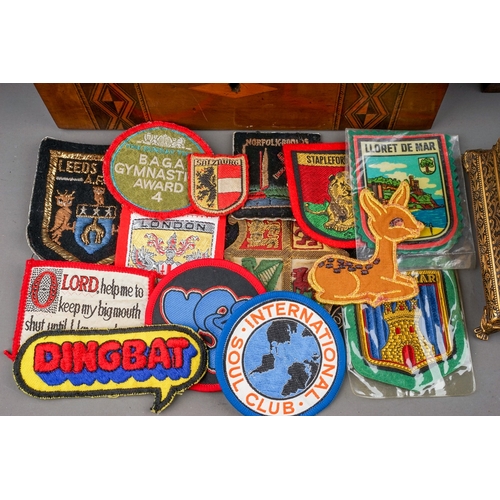 677 - A cased Hawkes & Son Excelsior Class clarinet, a small quantity of cloth badges including 'The Refer... 