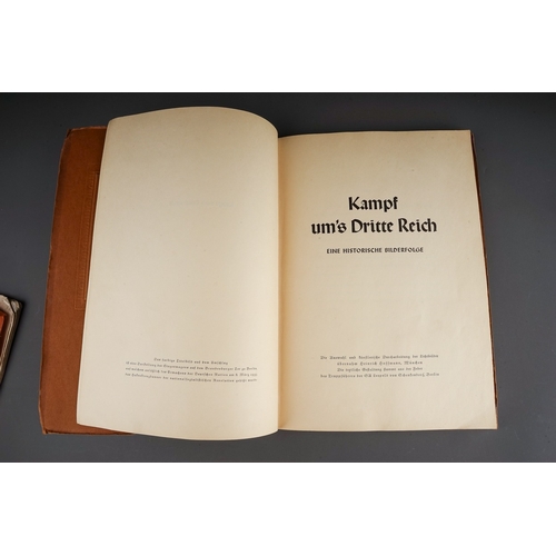 679 - A 1930`s German Kampf um's Dritte Reich gilt embossed album, containing colour cards of the Nazi par... 