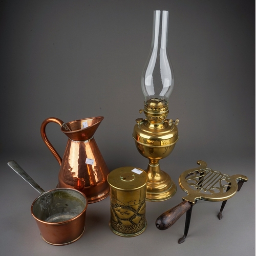 690 - A collection of brass and copperware to include: Duplex oil lamp base; a large serving jug, warming ... 