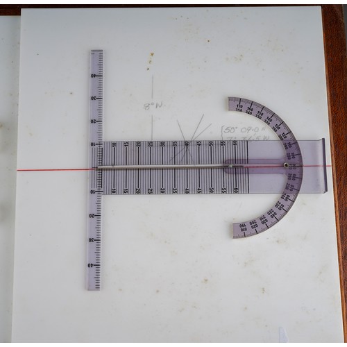 691 - An early 1970's wooden cased Webster Navigational Aids Star-Plot, the interior of the lid bears a ty... 