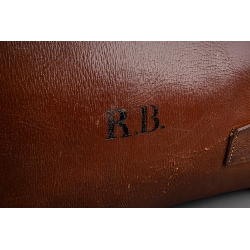 705 - A vintage large brown leather Gladstone bag, the side with initials RB, brass furniture, the body ap... 